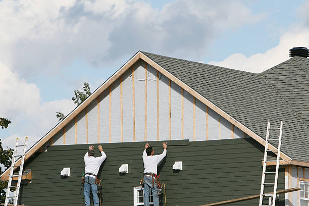 Professional Emergency Siding Repair technician working in Clifton, TX